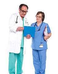 Image showing Doctors discussing a medical report