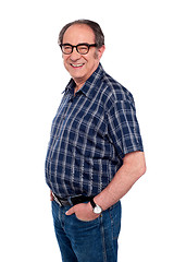 Image showing Man standing with hands in jeans pocket