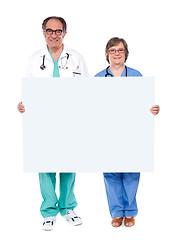 Image showing Medical professionals showing blank billboard