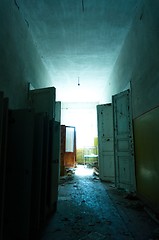 Image showing Doorway with bright light in an abandoned building