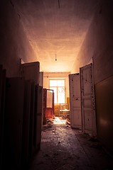 Image showing Doorway with bright light in an abandoned building