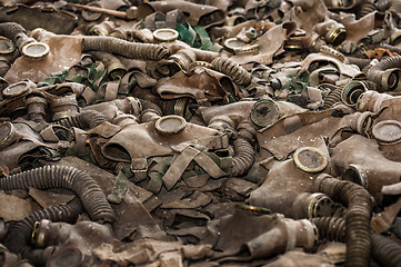 Image showing Vintage photo of many gasmasks