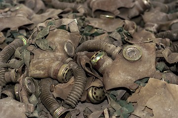 Image showing Vintage photo of many gasmasks