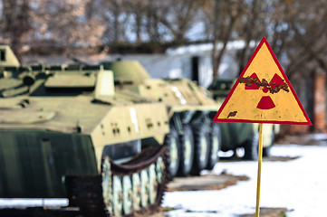 Image showing Radiation hazard sign with tanks