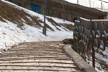 Image showing A stairway in the park with snow