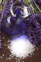 Image showing Lavender flowers with the bath salt and essential oil