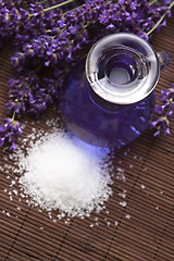 Image showing Lavender flowers with the bath salt and essential oil