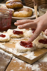 Image showing Detail of hands kneading dough