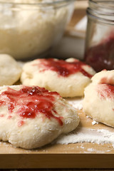 Image showing Sweet doughnuts with rose marmelade