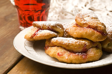 Image showing Sweet doughnuts with rose marmelade