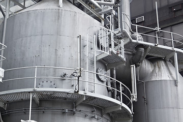 Image showing Pipes, tubes, machinery and steam turbine at a power plant 