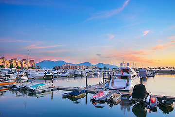 Image showing yachts in the golden coast sunset ,in hongkong 