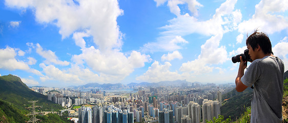 Image showing photographer take photo of city