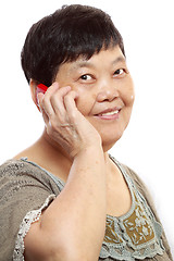 Image showing Senior Woman Talking On Mobile Phone