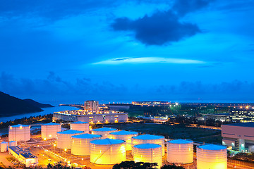 Image showing gas tank at night