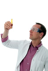 Image showing chemist looking on test glass