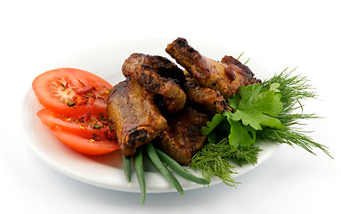 Image showing Barbecued pork ribs on white plate