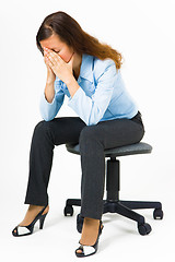 Image showing Stress. Woman hides her face