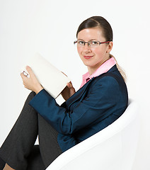 Image showing girl in glasses with a book