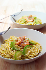 Image showing spaghetti pasta with fresh shrimps and zucchini sauce