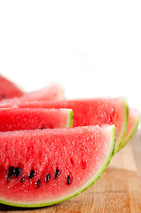 Image showing fresh watermelon on a  wood table