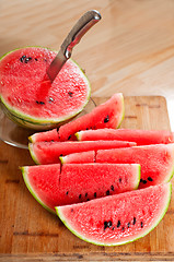 Image showing fresh watermelon on a  wood table