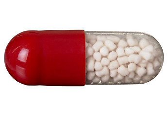 Image showing One red pill isolated on white