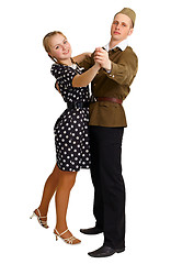 Image showing Pair in old-fashioned clothes dancing isolated on white