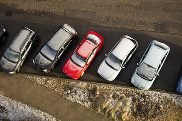 Image showing Cars covered snow stand in parking in winter 