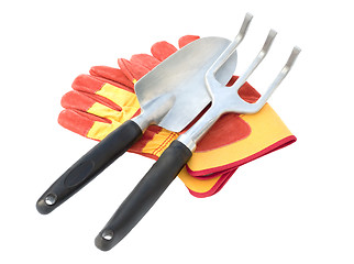 Image showing Gloves and  tool on a white