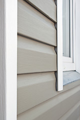 Image showing Wall is covered by vinyl siding