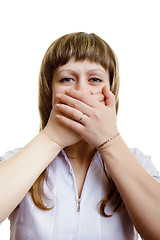 Image showing young girl covers her mouth with his hands