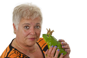 Image showing Senior female with a toy frog prince