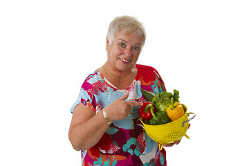 Image showing Female senior with fresh vegetables