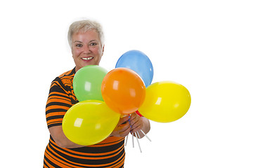 Image showing Female senior with colorful ballons 