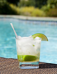 Image showing Cocktail Majito on edge by poolside