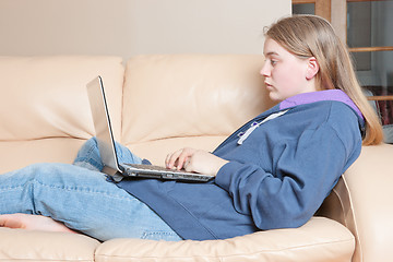 Image showing teenage girl using laptop