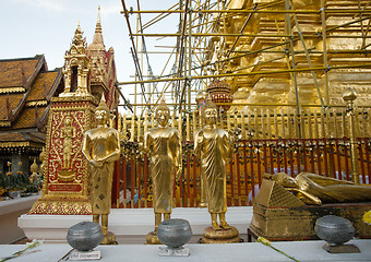 Image showing gold buddha statues