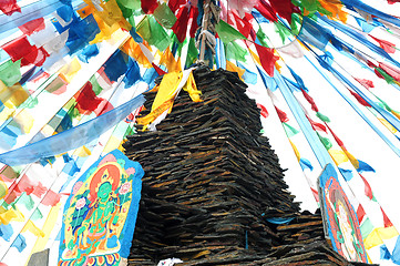 Image showing Tibetan prayer flags and mani rocks