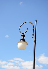 Image showing Park round light lamp on pole on background of sky 