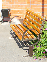 Image showing Wooden park bench in the garden