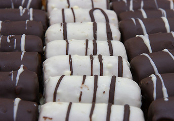 Image showing Round mini chocolate pie with strips from above