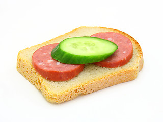 Image showing  sandwich with sausage and a cucumber 