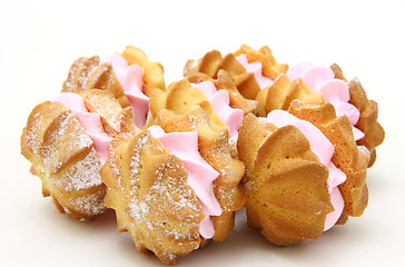 Image showing Yellow cookies with a  stuffing  on a white background 