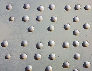 Image showing A silver painted metal aircraft background  with  rivets.
