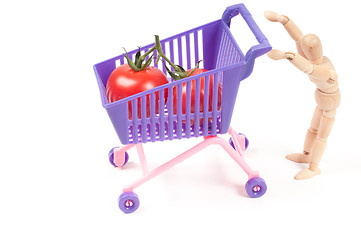 Image showing Conceptual photo with wooden man and shopping-cart