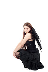 Image showing Beautiful brunette woman with black wings