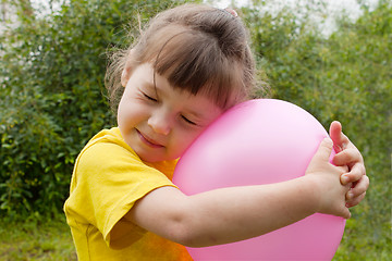 Image showing Baby girl and inflatable ball
