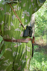 Image showing At the hunter with itself the field-glass and a knife