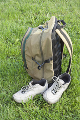 Image showing Backpack and sneakers tourists